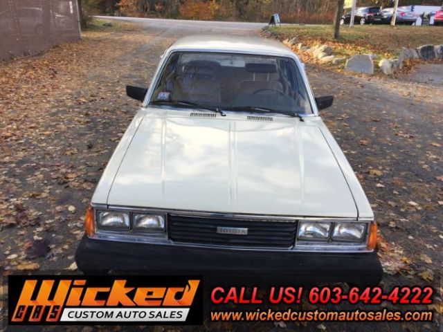 1981 beige Toyota Corona Sedan 4 Dr.
