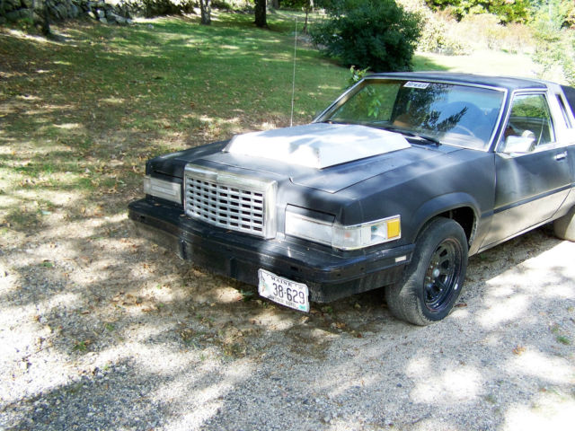 1981 flat black Ford Thunderbird