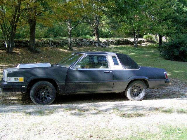 1981 flat black Ford Thunderbird