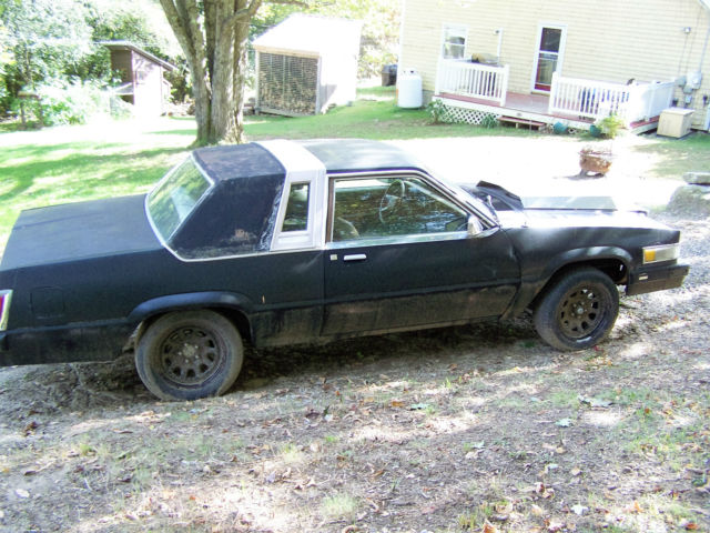 1981 flat black Ford Thunderbird