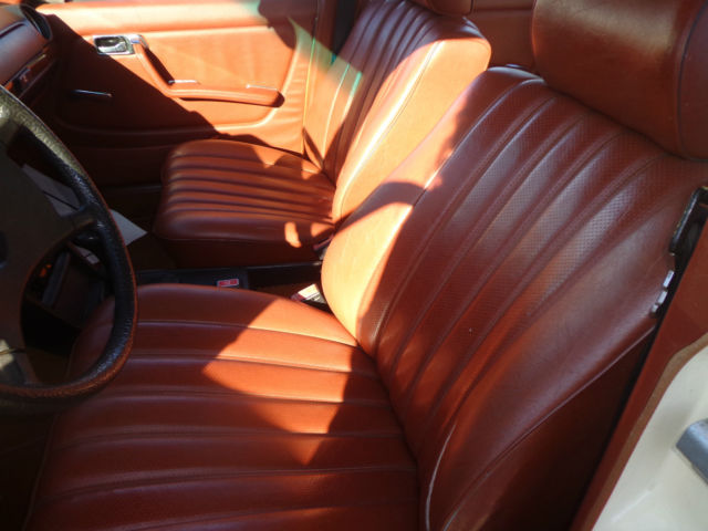 1981 cream Mercedes-Benz 200-Series Sedan