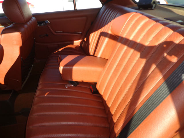 1981 cream Mercedes-Benz 200-Series Sedan