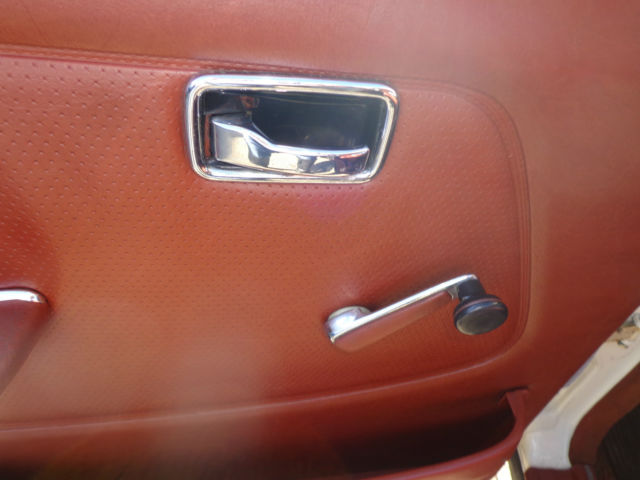 1981 cream Mercedes-Benz 200-Series Sedan