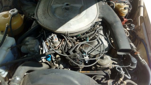 1982 yellow Mercedes-Benz SL-Class Convertible