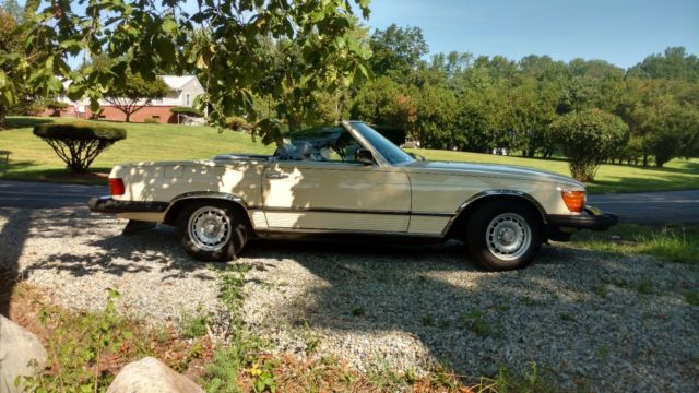 1982 yellow Mercedes-Benz SL-Class Convertible