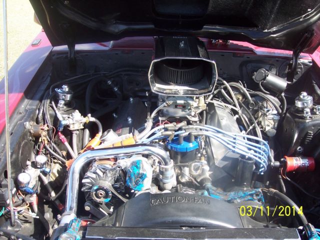 1982 red Ford Mustang