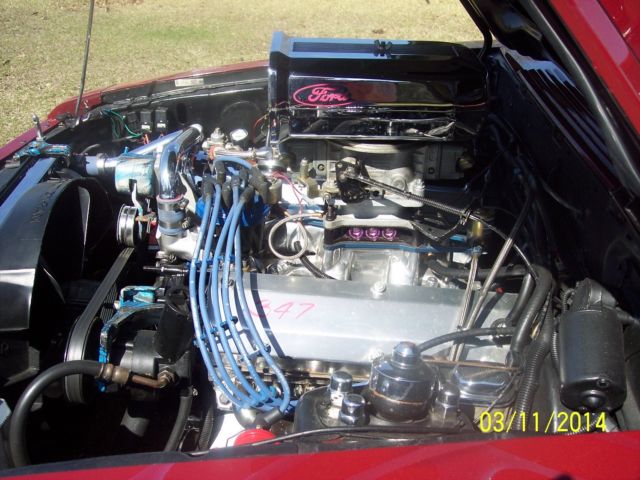 1982 red Ford Mustang