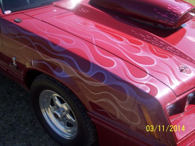 1982 red Ford Mustang