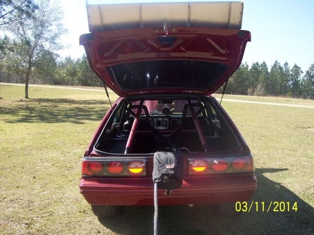 1982 red Ford Mustang