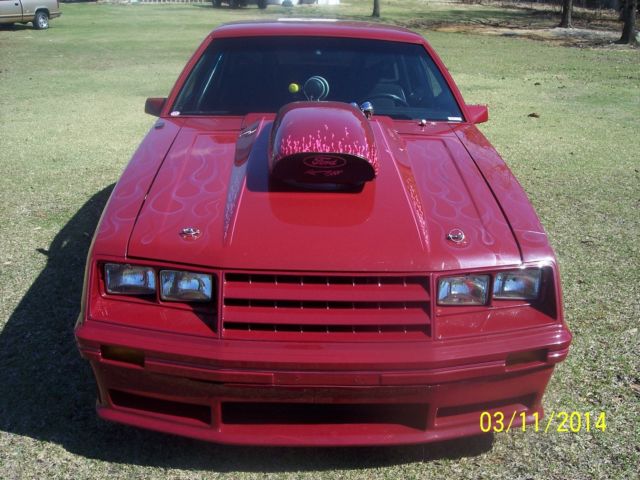1982 red Ford Mustang
