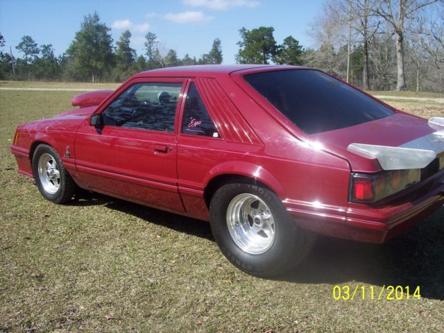 1982 red Ford Mustang