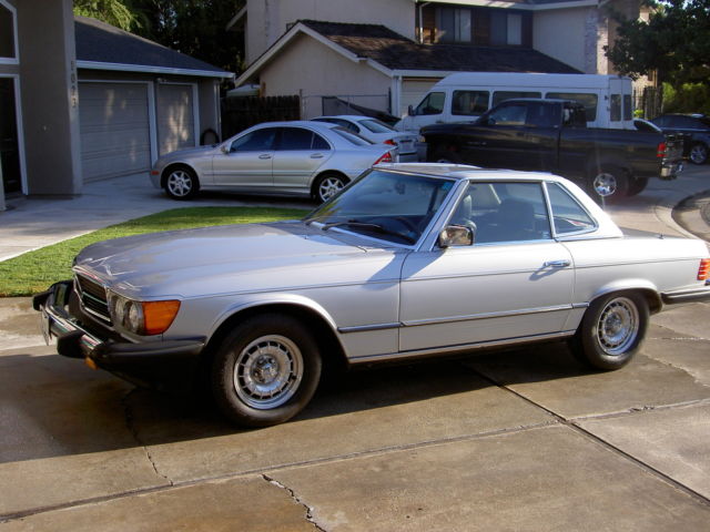 1982 silver Mercedes-Benz SL-Class 2 door roduster