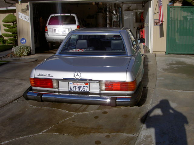 1982 silver Mercedes-Benz SL-Class 2 door roduster
