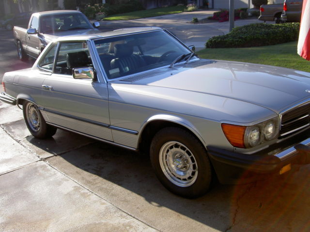 1982 silver Mercedes-Benz SL-Class 2 door roduster
