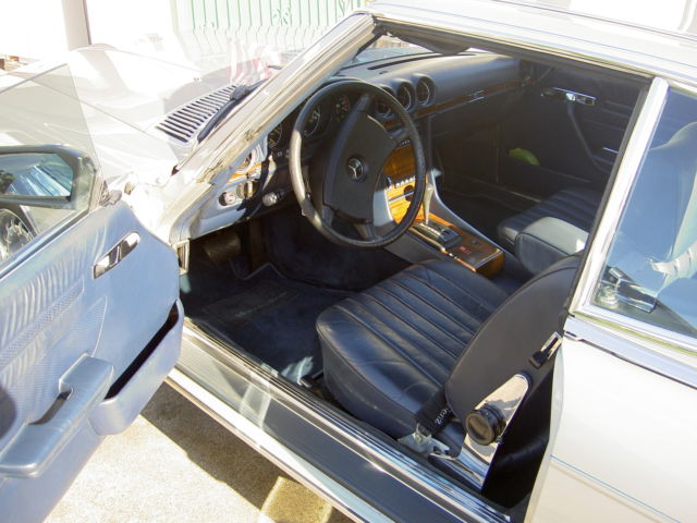 1982 silver Mercedes-Benz SL-Class 2 door roduster
