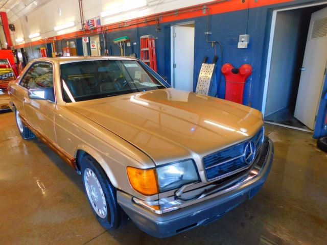 1982 Gold Mercedes-Benz 500-Series Sedan
