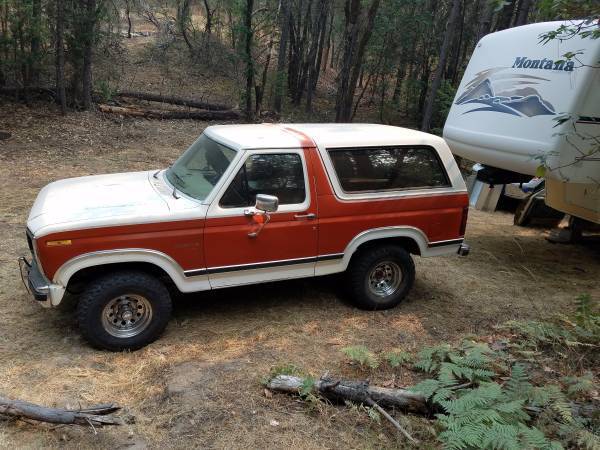 1983 red/white Ford Bronco SUV
