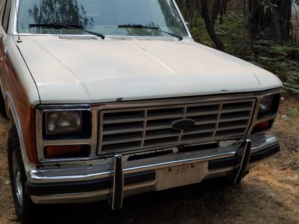 1983 red/white Ford Bronco SUV