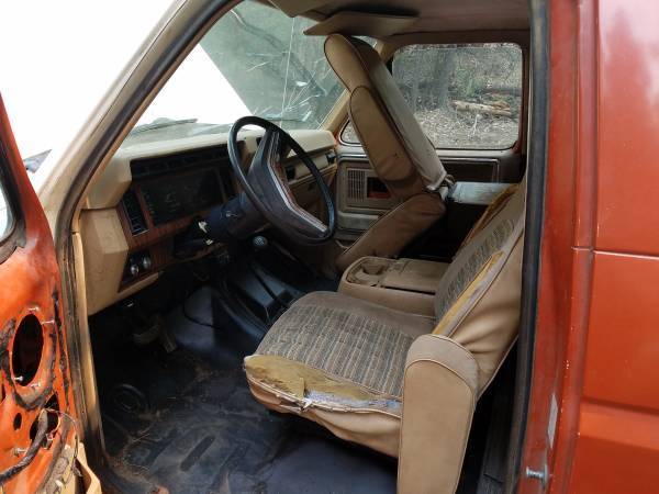 1983 red/white Ford Bronco SUV