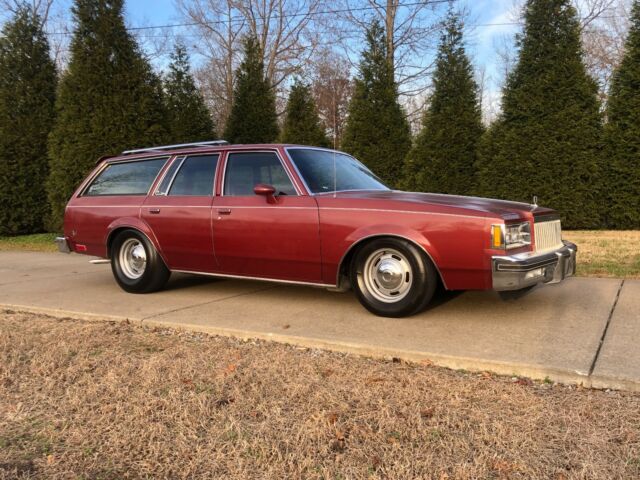 1983 maroon/black Chevrolet Malibu long roof