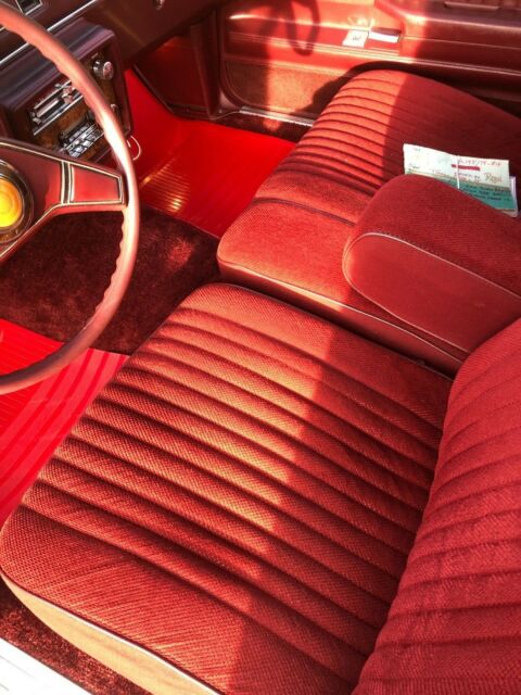 1983 maroon/black Chevrolet Malibu long roof