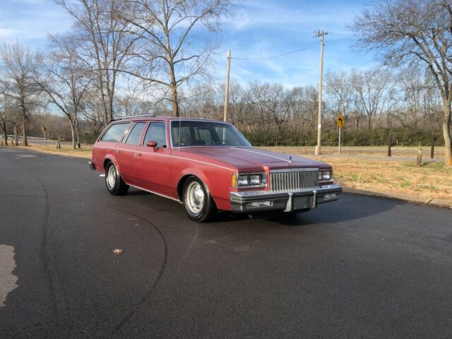 1983 maroon/black Chevrolet Malibu long roof