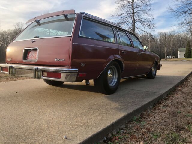 1983 maroon/black Chevrolet Malibu long roof