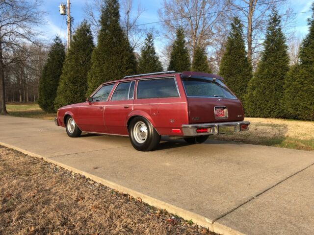 1983 maroon/black Chevrolet Malibu long roof