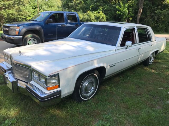 1983 White Cadillac Fleetwood Sedan