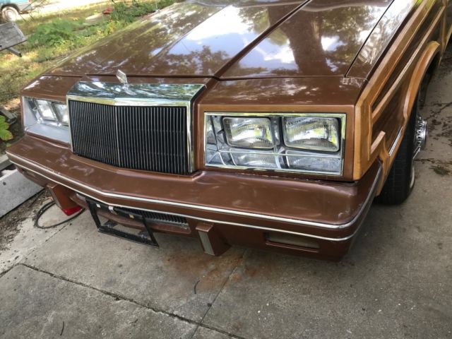 1983 Brown Chrysler LeBaron Convertible