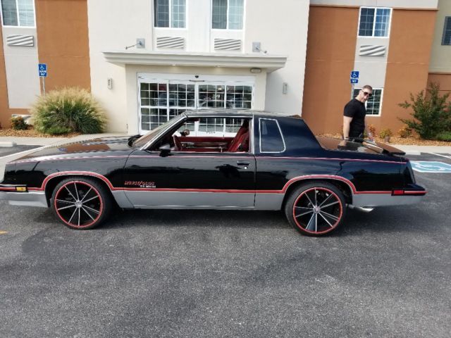 1983 Black Oldsmobile Cutlass Coupe