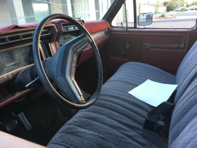 1983 Maroon Ford Bronco SUV