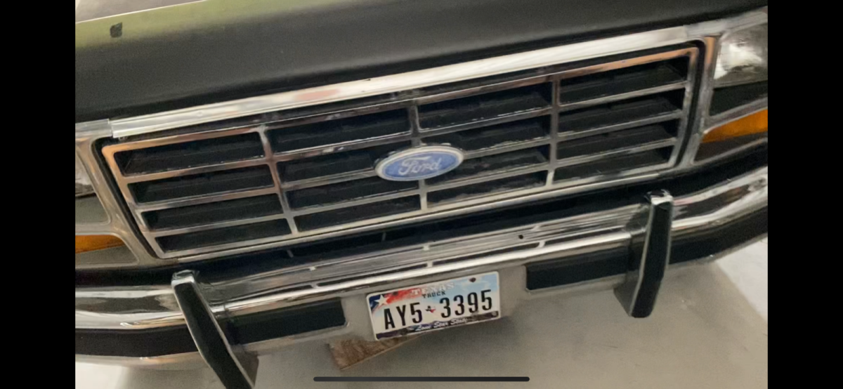 1983 Red and Black Ford F-150 Extended Cab Pickup