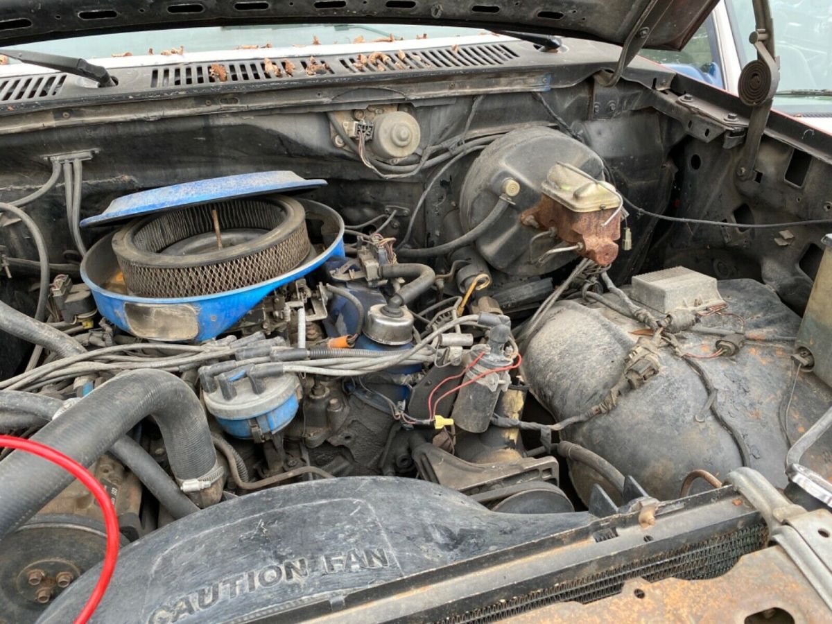 1983 Red and Black Ford F-150 Extended Cab Pickup