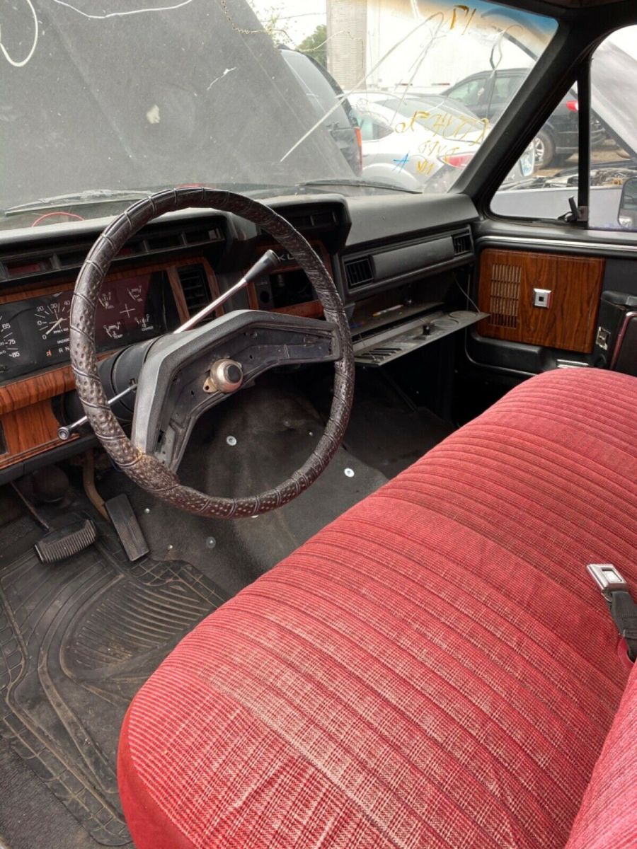 1983 Red and Black Ford F-150 Extended Cab Pickup