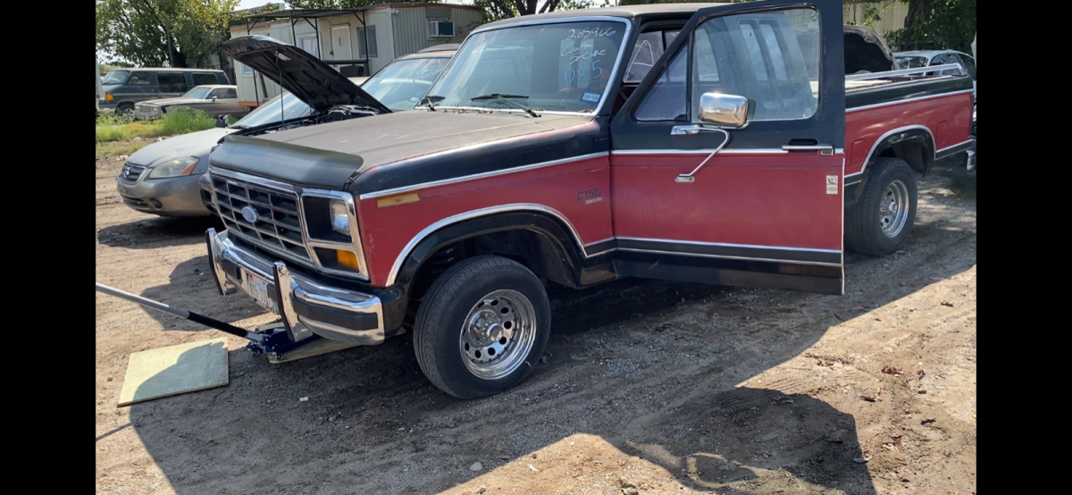 1983 Red and Black Ford F-150 Extended Cab Pickup