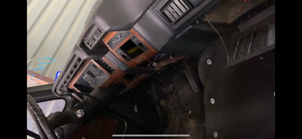 1983 Red and Black Ford F-150 Extended Cab Pickup