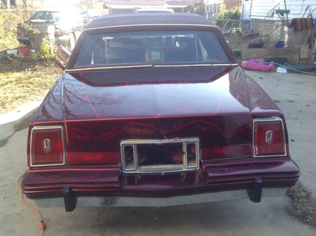 1983 Burgundy Pontiac Grand Prix Coupe