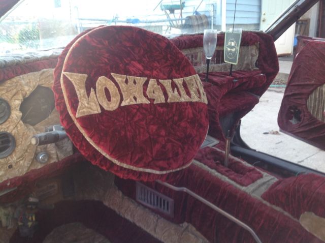 1983 Burgundy Pontiac Grand Prix Coupe