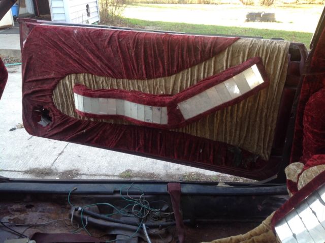 1983 Burgundy Pontiac Grand Prix Coupe