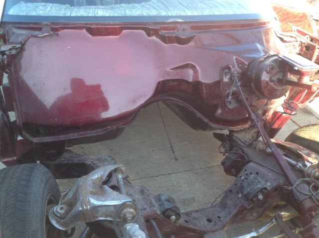 1983 Burgundy Pontiac Grand Prix Coupe