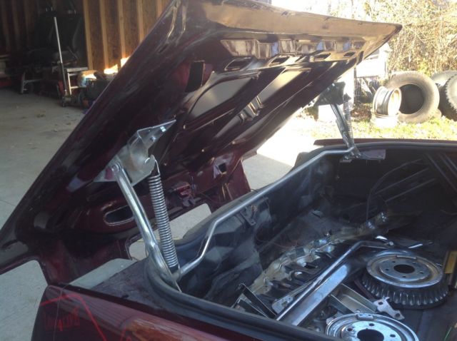 1983 Burgundy Pontiac Grand Prix Coupe