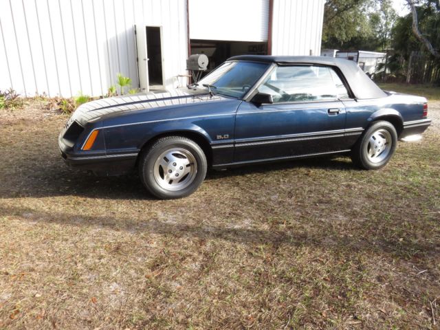 1983 blue Ford Mustang Convertible