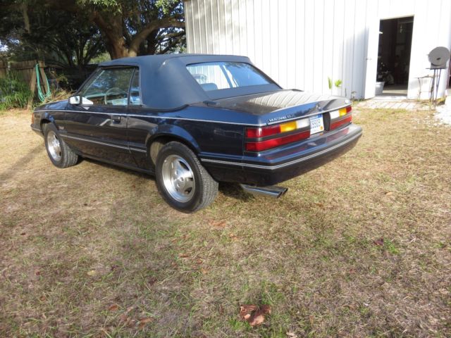 1983 blue Ford Mustang Convertible