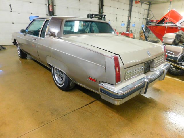1983 Tan Oldsmobile Ninety-Eight Coupe