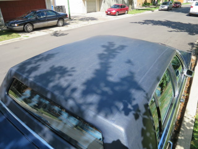 1984 Blue Cadillac Fleetwood Sedan