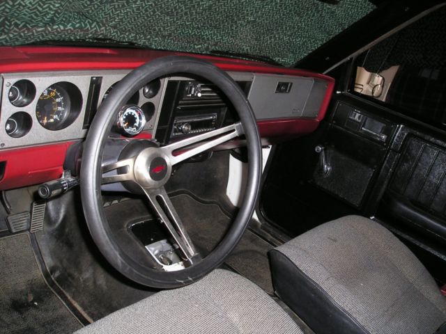 1984 black and gray Chevrolet S-10 reg. cab/ short bed