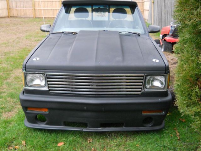 1984 black and gray Chevrolet S-10 reg. cab/ short bed