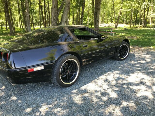 1984 black Chevrolet Corvette Coupe