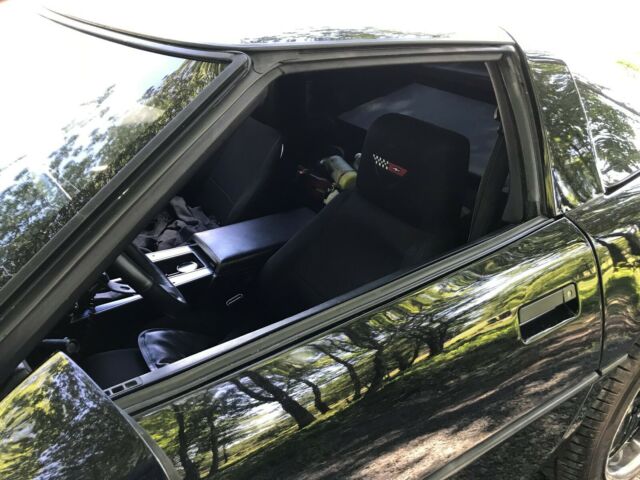 1984 black Chevrolet Corvette Coupe